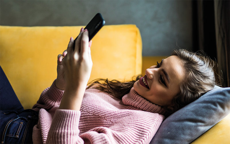 Woman looking at her mobile phone